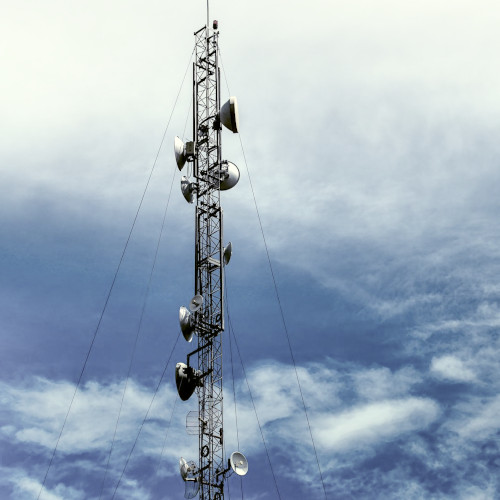 A guyed communication tower.